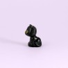 Black Cat with Tongue Poking Out