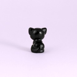 Black Cat with Tongue Poking Out