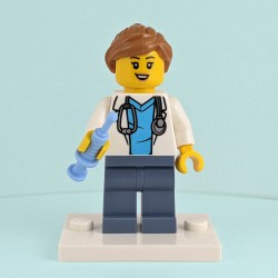 Female LEGO Doctor Minifigure with Syringe and White Baseplate