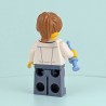 Female LEGO Doctor Minifigure with Syringe and White Baseplate